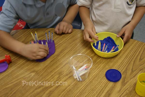 Add birthday candles for kids to make play dough cakes