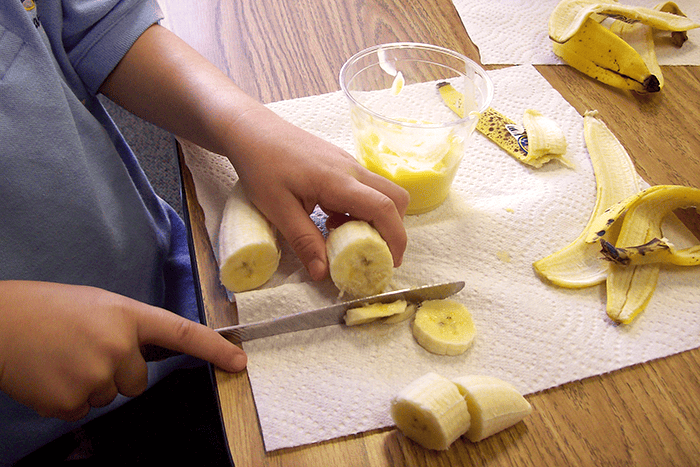 slice bananas cooking and fine motor