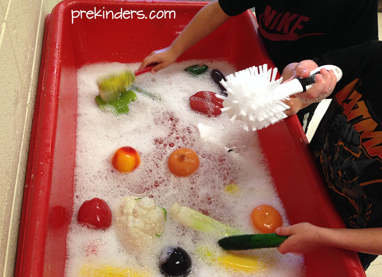 Veggie Scrubbing Sensory Table Play