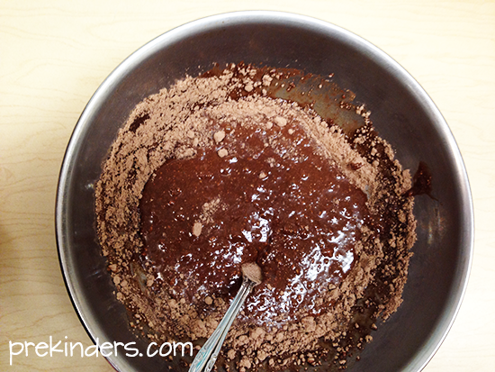 mixing the donut batter