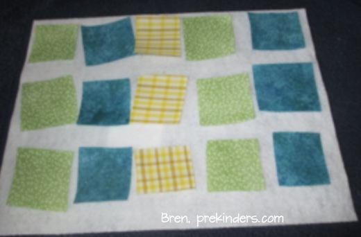 Fabric squares on the felt