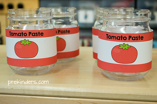 Tomato paste jars for dramatic play pizza shop