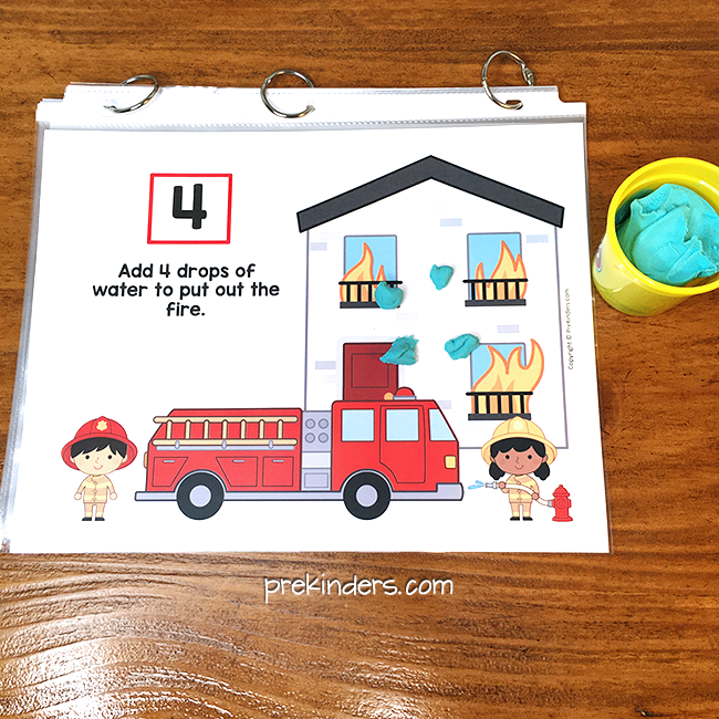 make play dough "splashes" of water and count 4 onto the fire safety play dough mat