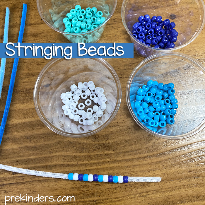 stringing winter beads for fine motor