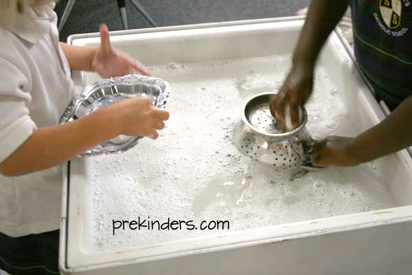 End of Year Clean up: Wash class materials in the sensory table