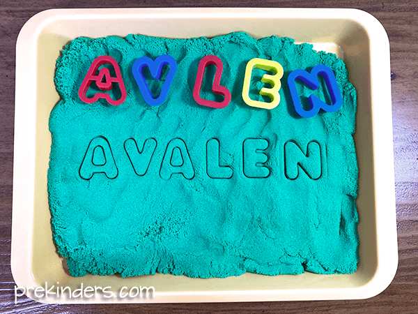 name activities for preschool: Kinetic Sand Cookie Cutter Names