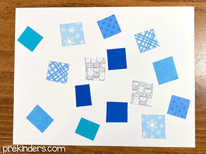 Scrapbook paper in winter blue colors and prints 