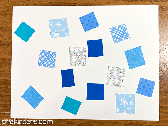 Scrapbook paper in winter blue colors and prints