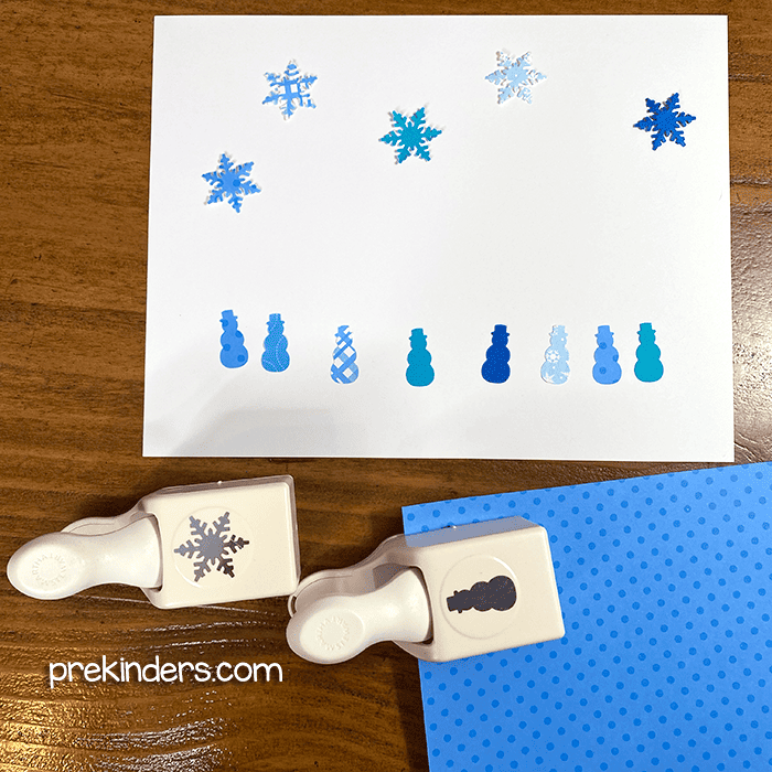 Paper punches of snowmen and snowflakes 